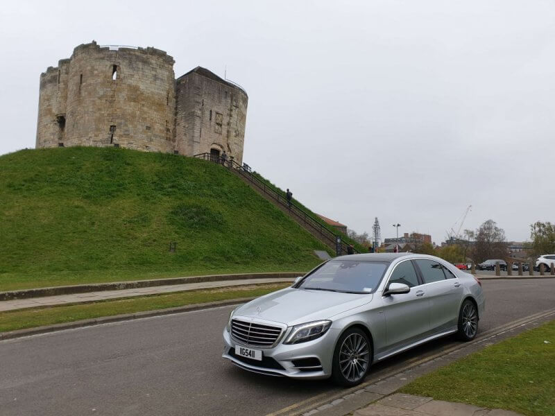 Our 2018 Mercedes s class next to Cliffords Tower York